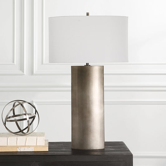 V-Groove Table Lamp by Uttermost in dark steel gray. Made from iron, fabric in a modern style.