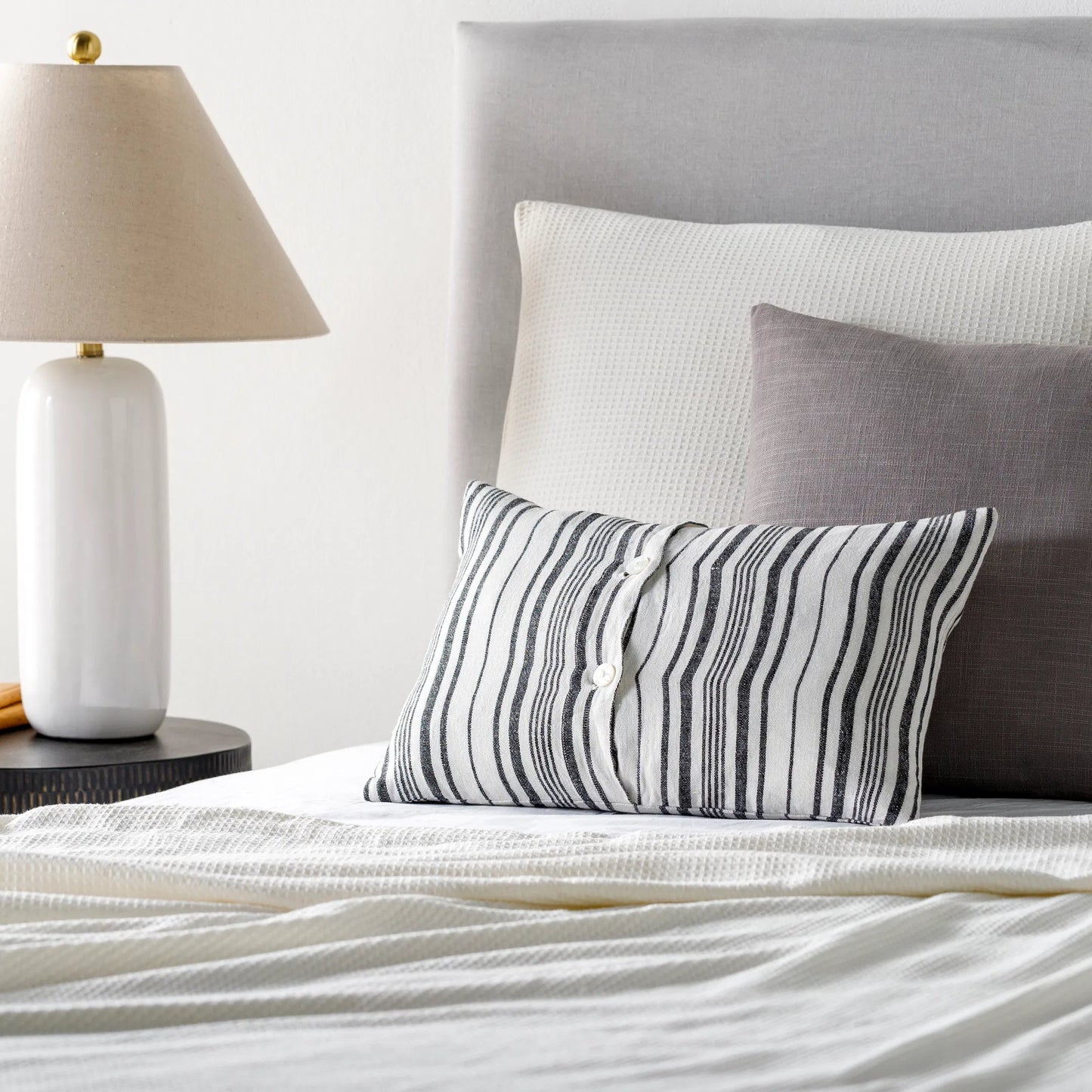 009 SI-1885231,SI-1885232,SI-1885233,SI-1885234,SI-1885235,SI-1885236 | Lifestyle | Linen Stripe Buttoned Pillow - 28950 by Surya in cream, black. Made from 100% linen in a unique style.