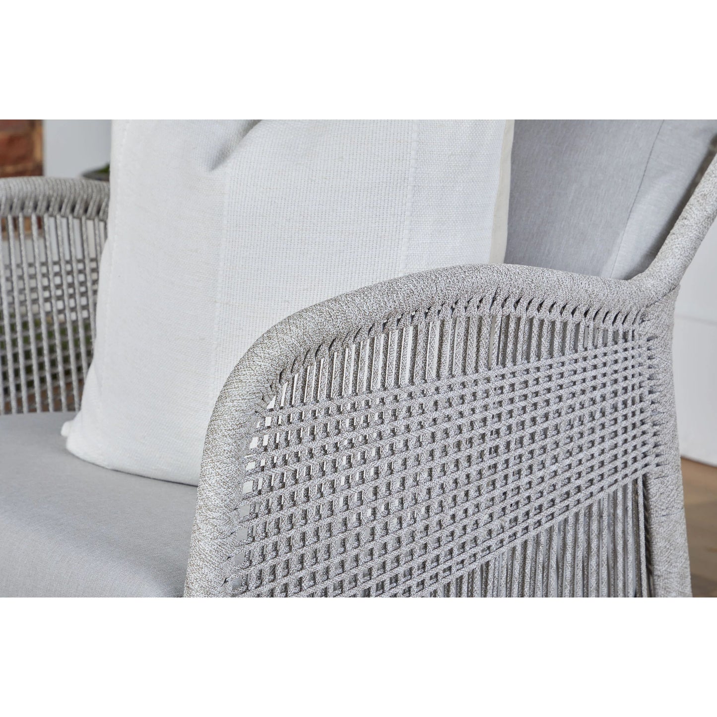 010 SI-2021723 | Closeup | Loom Club Chair by Essentials For Living in gray teak, taupe, white flat rope, performance pumice. Made from solid teak wood, aluminum, 100% polyolefin rope, 100% olefin fabric, foam in a coastal style.