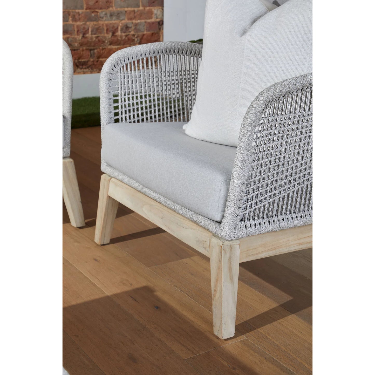 011 SI-2021723 | Closeup | Loom Club Chair by Essentials For Living in gray teak, taupe, white flat rope, performance pumice. Made from solid teak wood, aluminum, 100% polyolefin rope, 100% olefin fabric, foam in a coastal style.