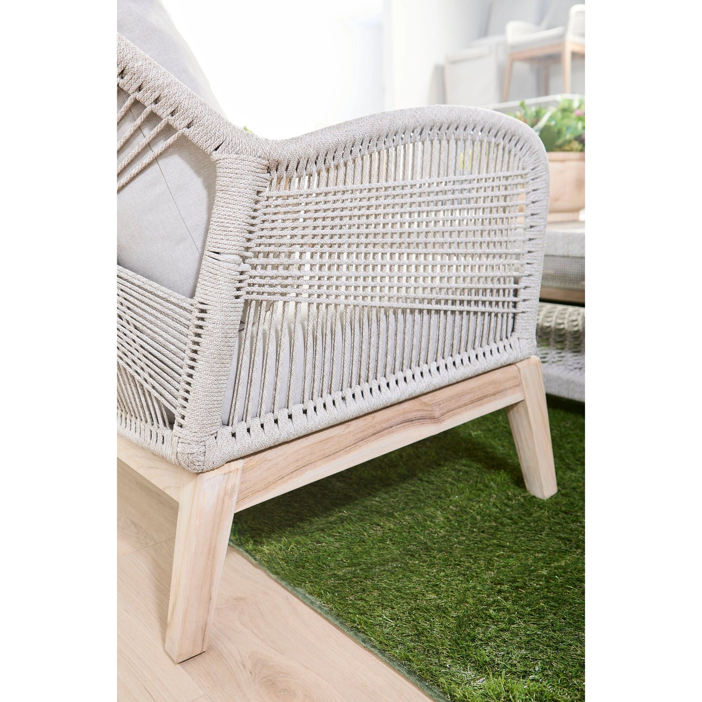 013 SI-2021723 | Lifestyle | Loom Club Chair by Essentials For Living in gray teak, taupe, white flat rope, performance pumice. Made from solid teak wood, aluminum, 100% polyolefin rope, 100% olefin fabric, foam in a coastal style.
