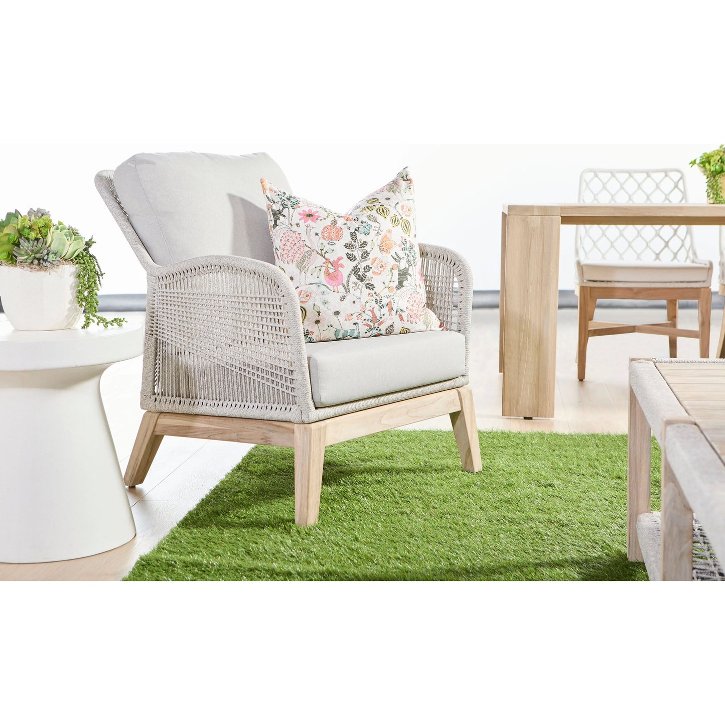 012 SI-2021723 | Lifestyle | Loom Club Chair by Essentials For Living in gray teak, taupe, white flat rope, performance pumice. Made from solid teak wood, aluminum, 100% polyolefin rope, 100% olefin fabric, foam in a coastal style.
