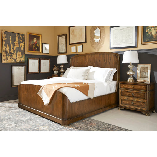 Viceroy Panel Bed by Jonathan Charles in brown and santos brown, antique brass. Made from mahogany, cerejeira veneers, santos rosewood crown veneers, brass in a traditional style.