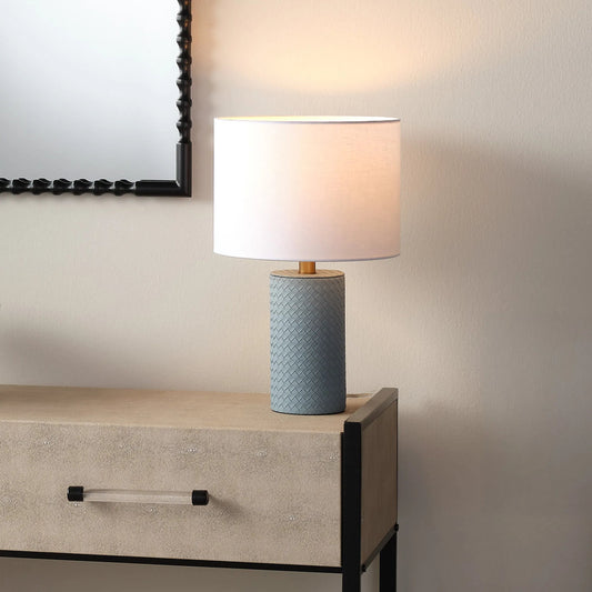 Roman Table Lamp by Jamie Young. Made from polyresin, leather in a modern style.