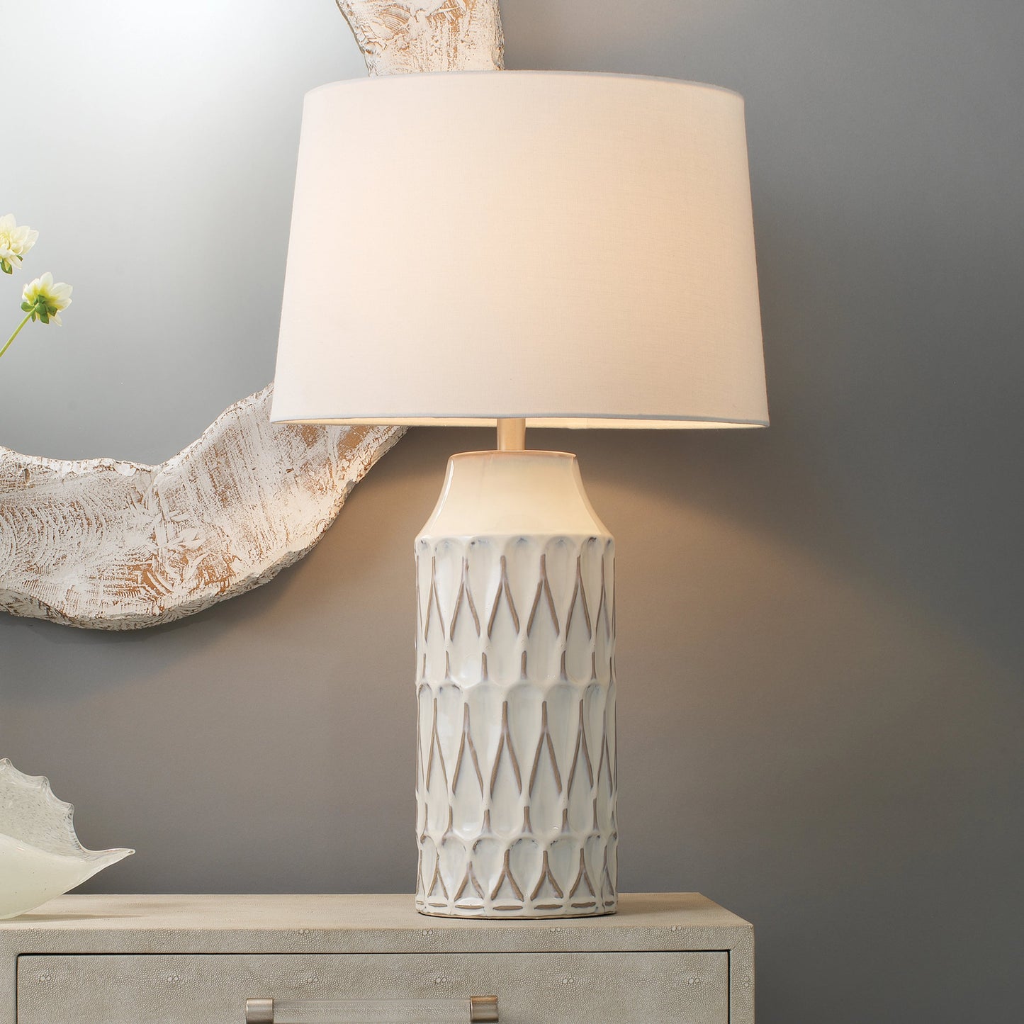005 SR-819642 | Lifestyle | Dalia Table Lamp by The Livingston Collection in white patterned ceramic. Made from ceramic, linen in a coastal style.