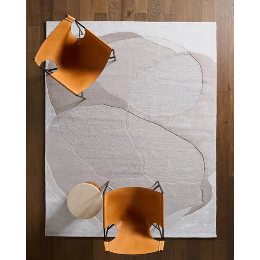 Layered Form LYD02 Rug by Jaipur Living in ivory, white, tan, beige. Made from 65% viscose 35% wool in a unique style.