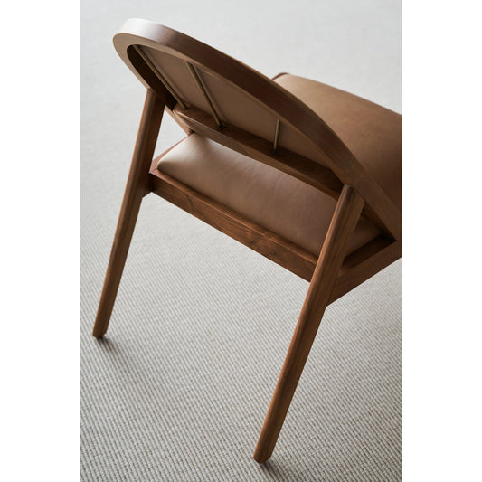 Rhythm Lounge Chair by Caracole in saddle and natural walnut. Made from walnut in a modern style.