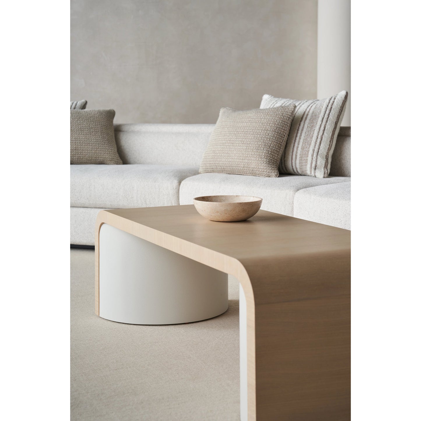 004 SI-2095981 | Lifestyle | Movement Cocktail Table by Caracole in sun drenched oak, textured adobe. Made from oak, quartersawn oak in a modern style.