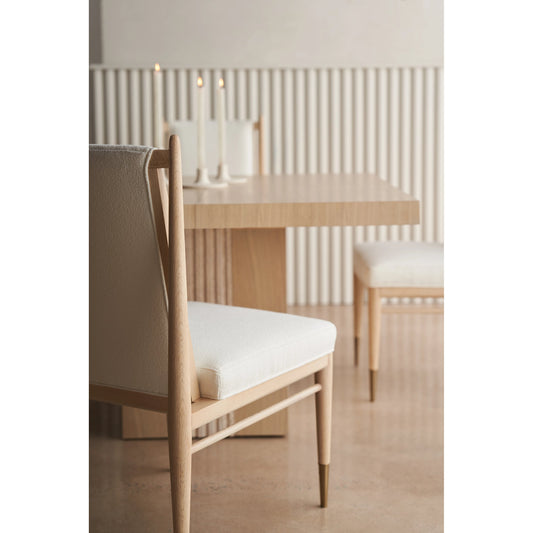Unity Light Dining Chair by Caracole in ivory and sun drenched oak. Made from oak in a modern style.