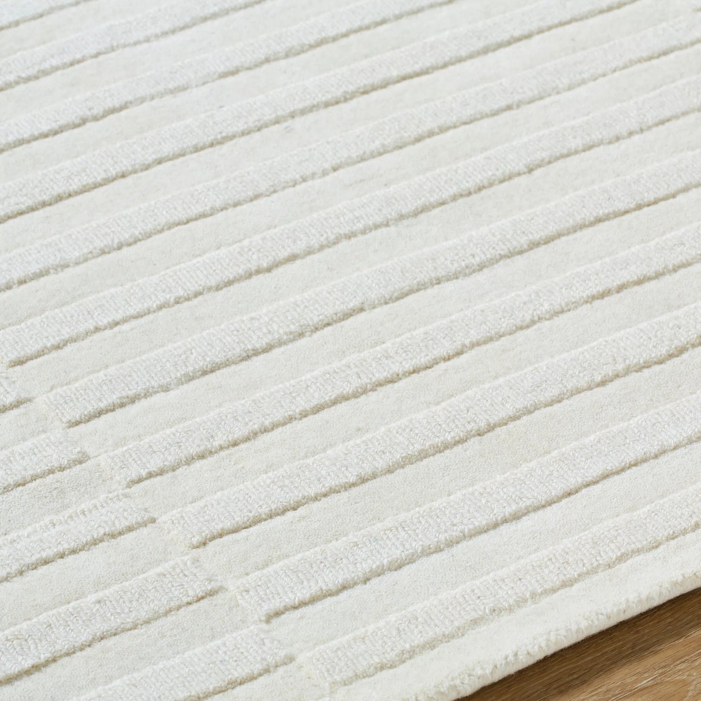 004 SI-2167670,SI-2167671,SI-2167672,SI-2167673 | Closeup | Mystique Rug - 489184 by Livabliss in ivory, cream, pearl. Made from wool in a unique style.