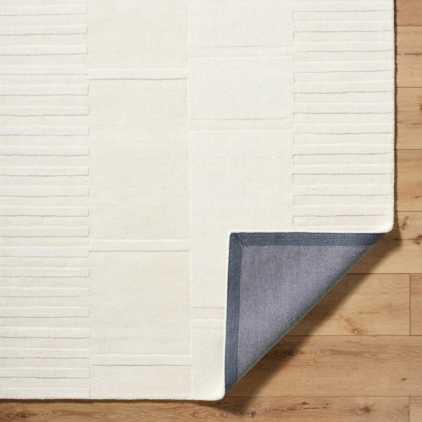 002 SI-2167674,SI-2167675,SI-2167676,SI-2167677 | Closeup | Mystique Rug - 489193 by Livabliss in ivory, cream, beige. Made from wool in a unique style.