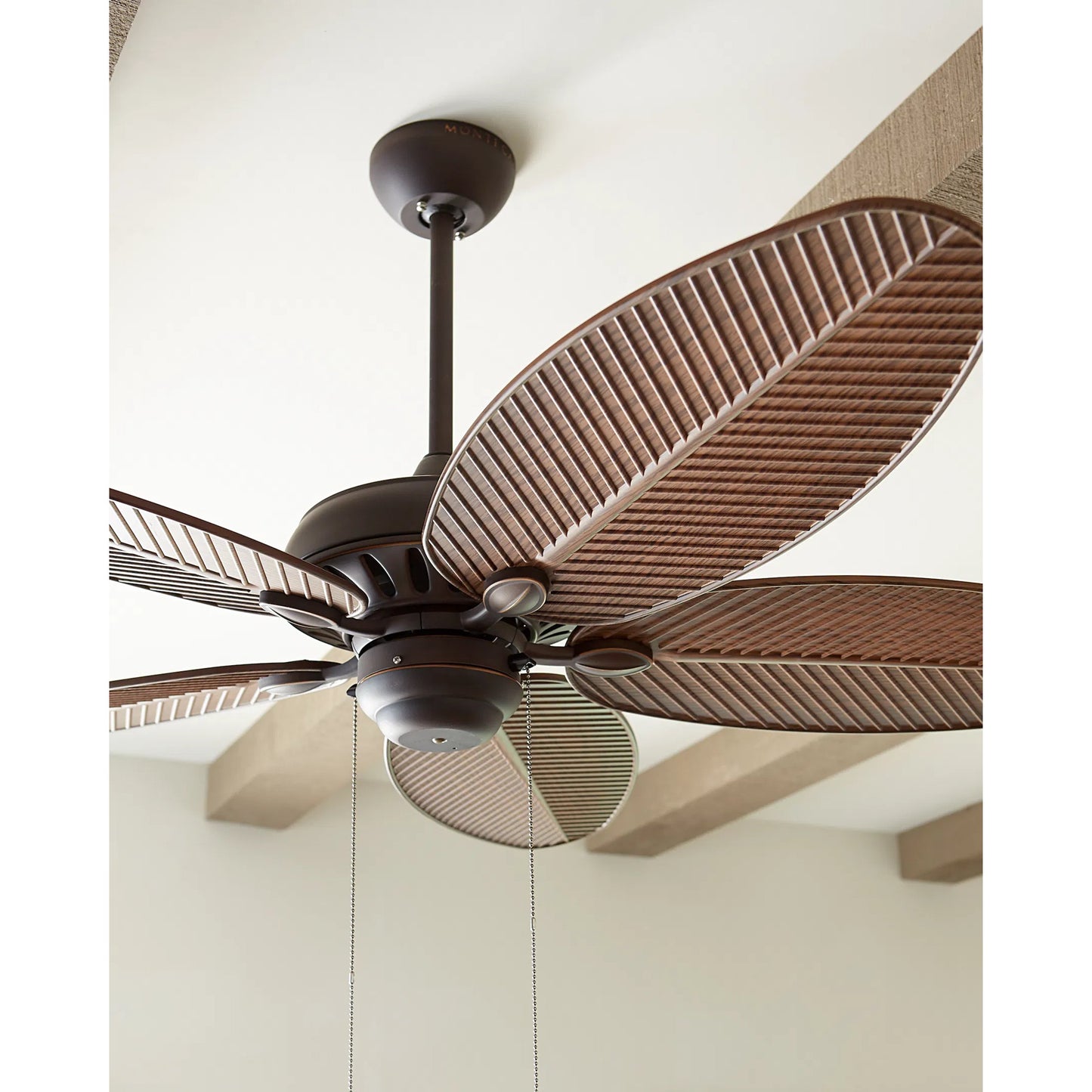 004 S-283582 | Closeup | Cruise Palm Leaf Outdoor Fan by Monte Carlo. Made from unique in a coastal style.