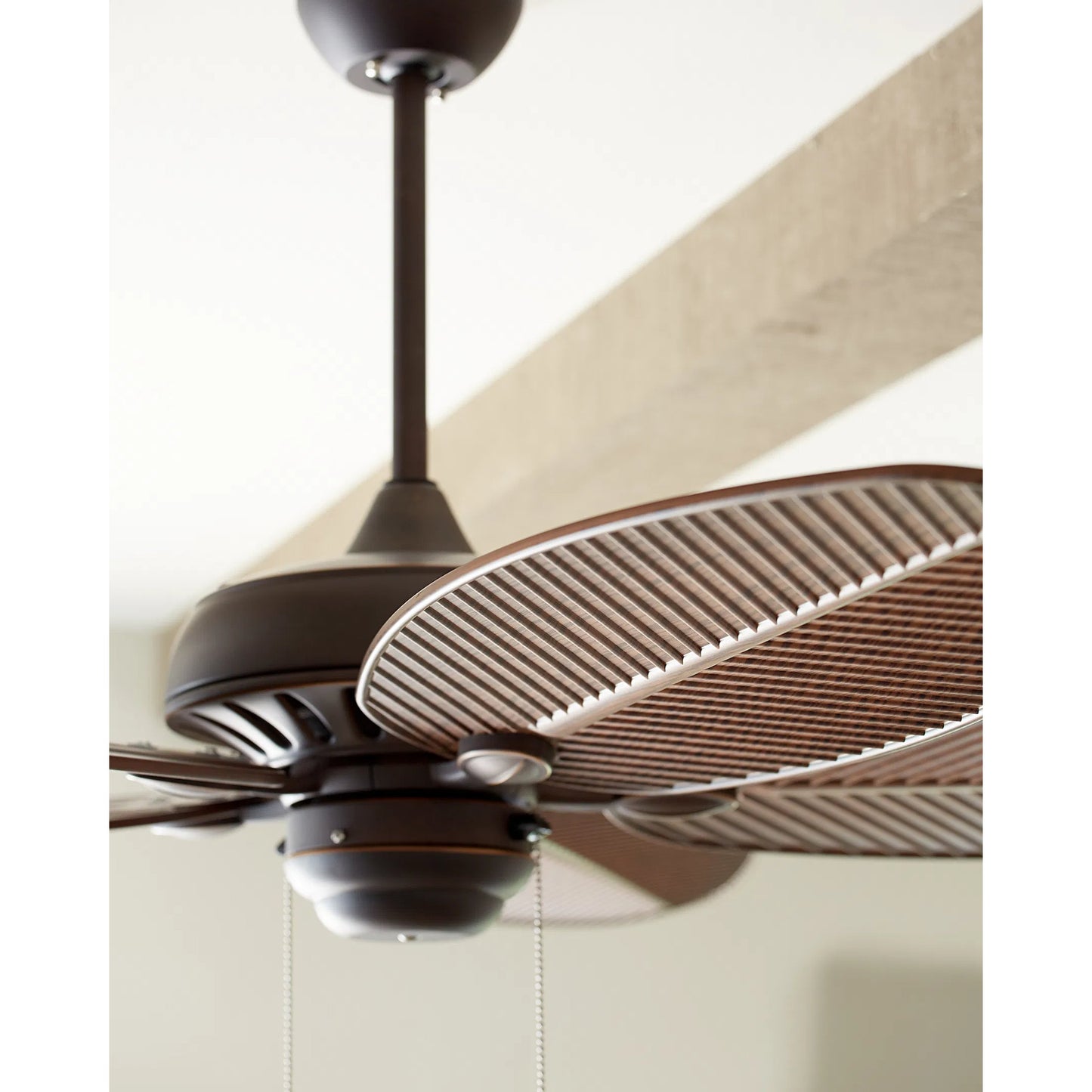 005 S-283582 | Closeup | Cruise Palm Leaf Outdoor Fan by Monte Carlo. Made from unique in a coastal style.