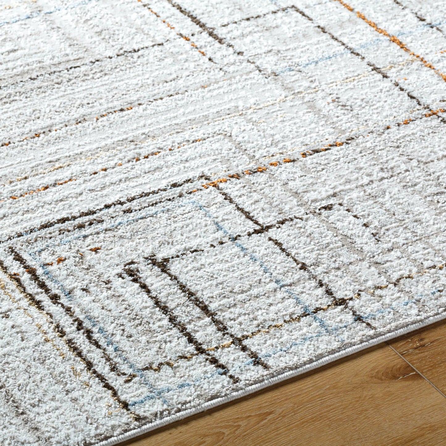 005 SI-2132281 | Closeup | Mood Rug - 500064 by Livabliss in taupe, white, dark brown, medium brown, mustard, denim. Made from face: 70% polypropylene, 30% polyester, warp: 100% polyester in a unique style.