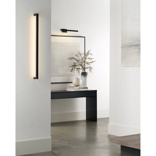 Stagger Medium Wall Sconce by Visual Comfort & Co.. Made from aluminum or brass in a transitional style.