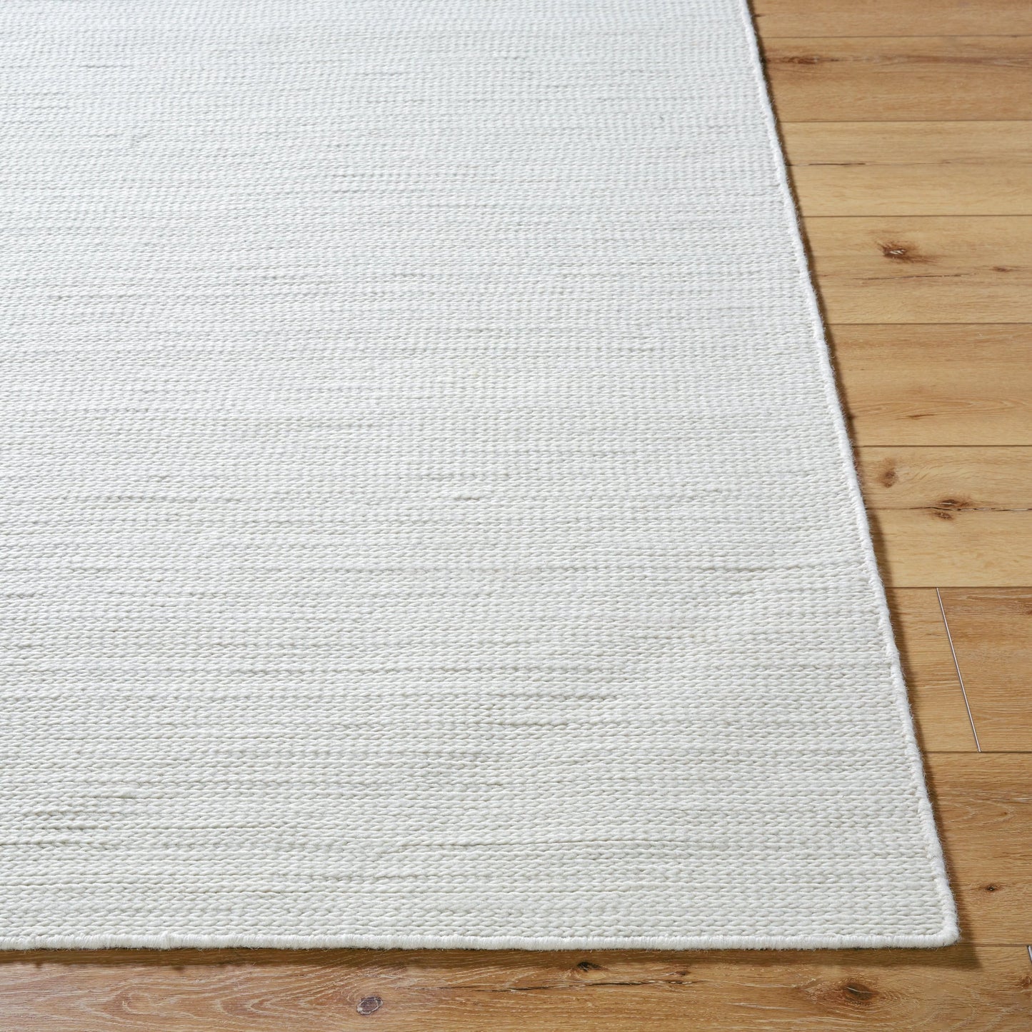 002 SI-2169388,SI-2169389,SI-2169390,SI-2169391,SI-2169392,SI-2169393 | Closeup | Mia Rug - 8875 by Livabliss in light silver, slate, silver. Made from wool in a unique style.