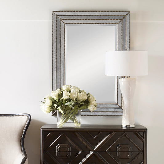 Seymour Mirror by Uttermost in silver. Made from wood in a transitional style.