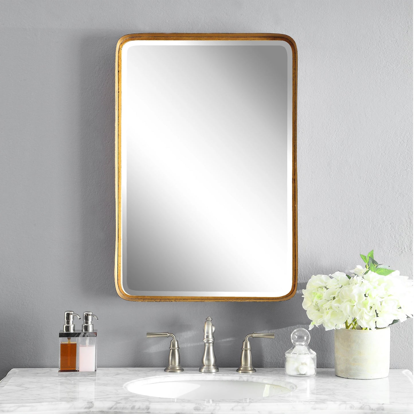 003 S-252122 | Lifestyle | Crofton Vanity Mirror by Uttermost in gold. Made from metal in a modern style.