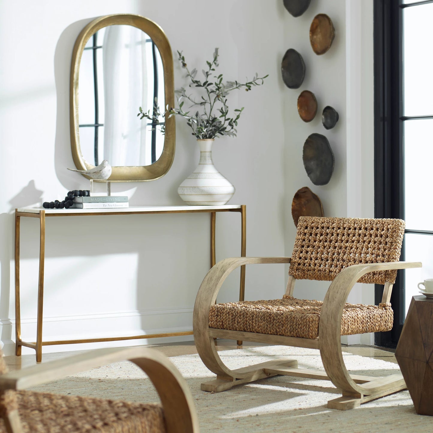 007 SI-2146802 | Lifestyle | Bradano Arch Mirror by Uttermost in brass. Made from cast aluminum, glass, mdf in a modern style.