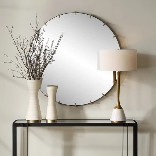 Pali Industrial Round Mirror by Uttermost in gold. Made from iron, mdf, glass in a transitional style.