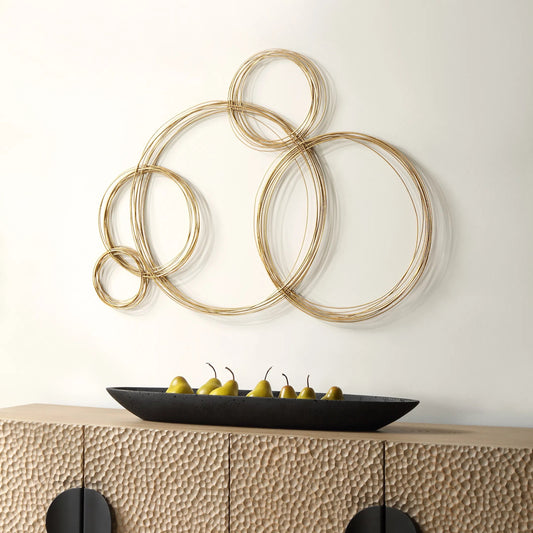 Bubbles Wall Decor by Uttermost in gold leaf. Made from iron in a transitional style.