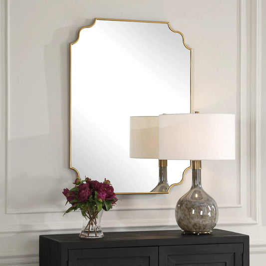 Lennyn Vanity Mirror by Uttermost in gold leaf. Made from mirror, mdf in a transitional style.