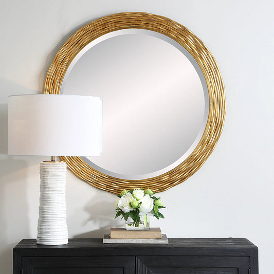 Celeste Round Mirror by Uttermost in gold leaf. Made from iron, mirror, mdf in a modern style.