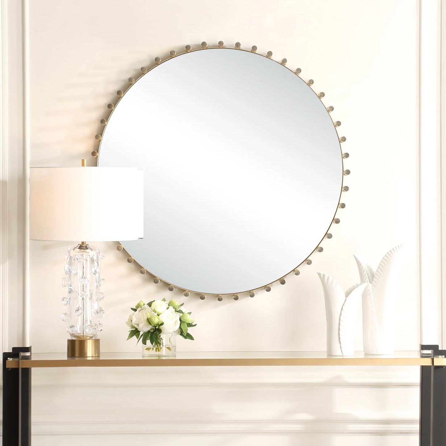 003 SI-2295170 | Lifestyle | Avelyne Round Mirror by Uttermost in brass. Made from iron, mirror, mdf, acrylic in a transitional style.