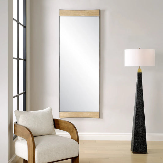 Russo Oversized Modern Mirror by Uttermost in bronze. Made from iron, mirror, mdf, travertine in a transitional style.