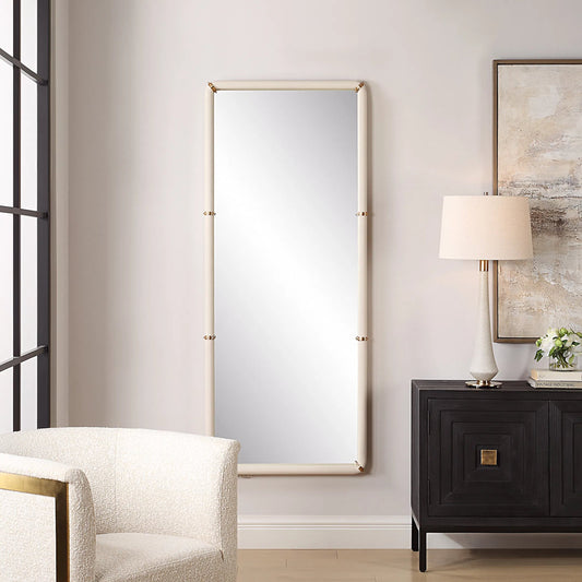 Cyprus Dressing Mirror by Uttermost in brass. Made from steel, mirror, mdf, pu leather, aluminum in a transitional style.