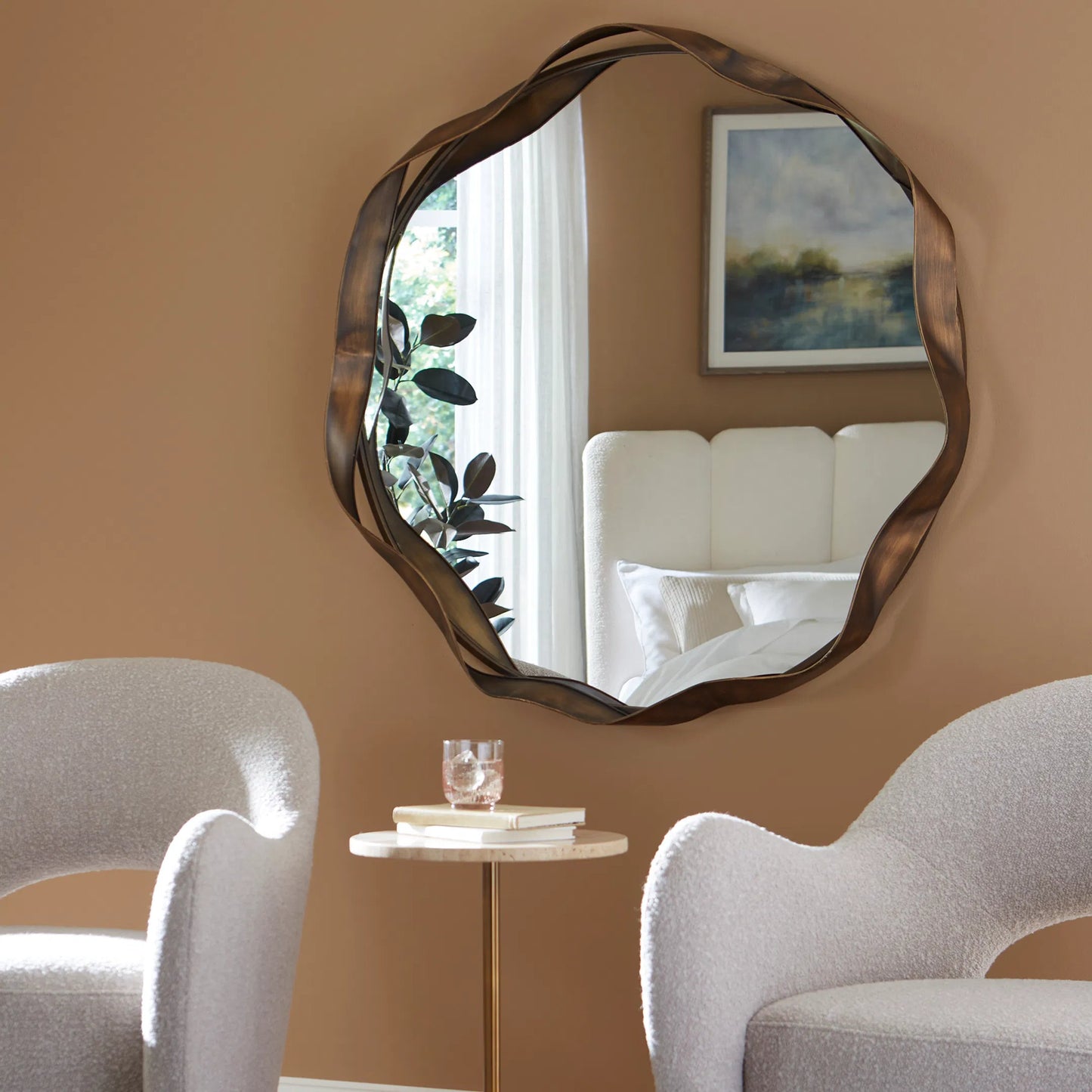 002 SI-2295171 | Lifestyle | Catch the Wave Round Mirror by Uttermost in bronze. Made from mirror, mdf, iron in a unique style.