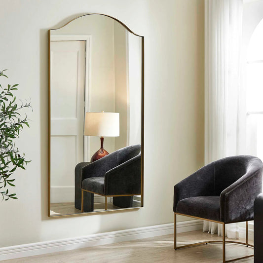 Mallorca Arch Mirror by Uttermost in brass. Made from stainless steel, mirror, mdf in a transitional style.