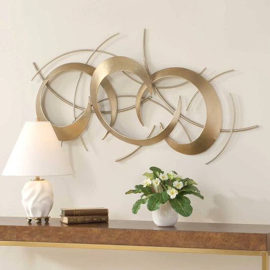 Motivate Wall Art by Uttermost in antique gold. Made from iron in a modern style.