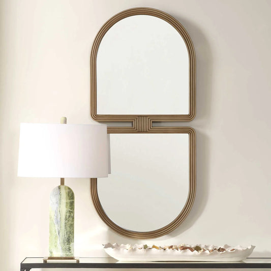 Jacques Art Deco Mirror by Uttermost in antiqued gold. Made from mdf, mirror in a transitional style.