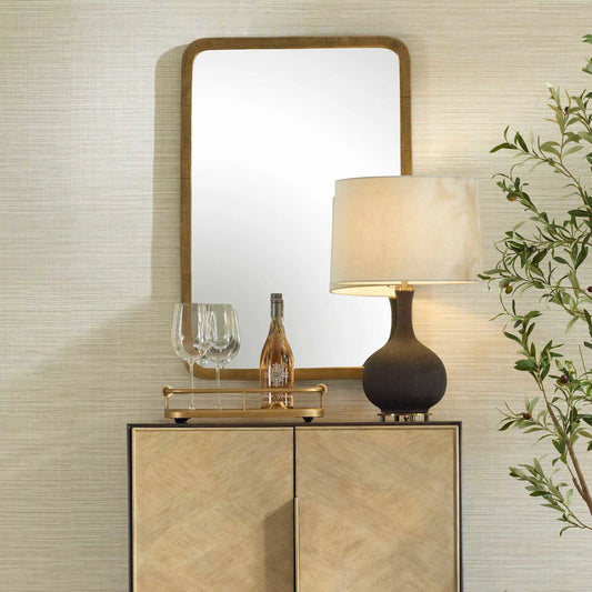 Vestry Antique Mirror by Uttermost in brass. Made from aluminum, glass, mdf in a transitional style.