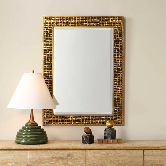 Woven in Time Mirror by Uttermost in gold leaf. Made from resin, mirror, mdf in a unique style.
