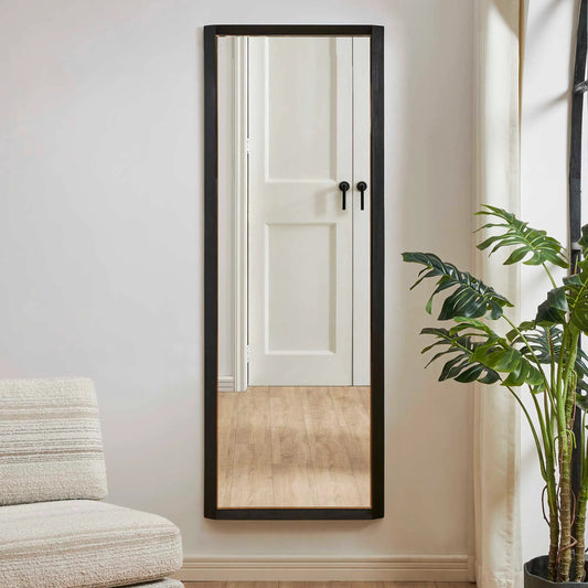 Stenton Tall Mirror by Uttermost in black. Made from rubber wood, mdf, mirror, s.s. in a unique style.