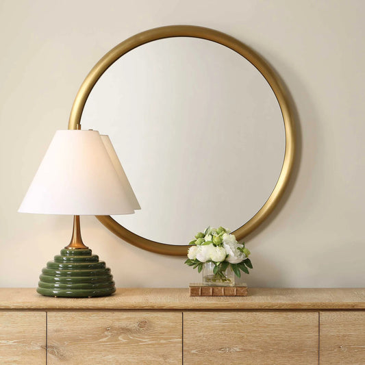 Atkinson Modern Round Mirror by Uttermost in antiqued brass. Made from stainless steel, mdf, mirror in a unique style.