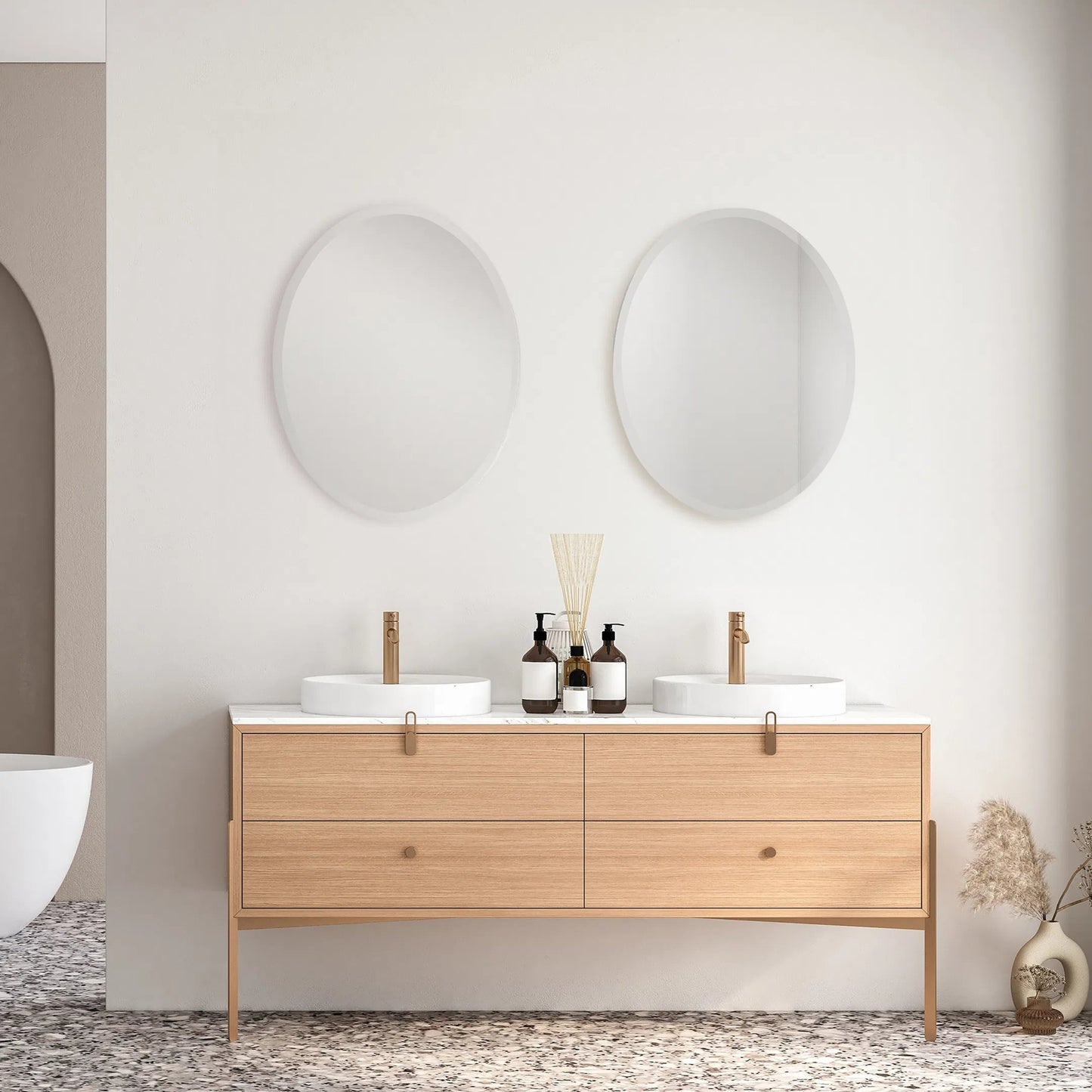002 S-252394 | Lifestyle | Frameless Vanity Oval Mirror by Uttermost. Made from glass in a modern style.
