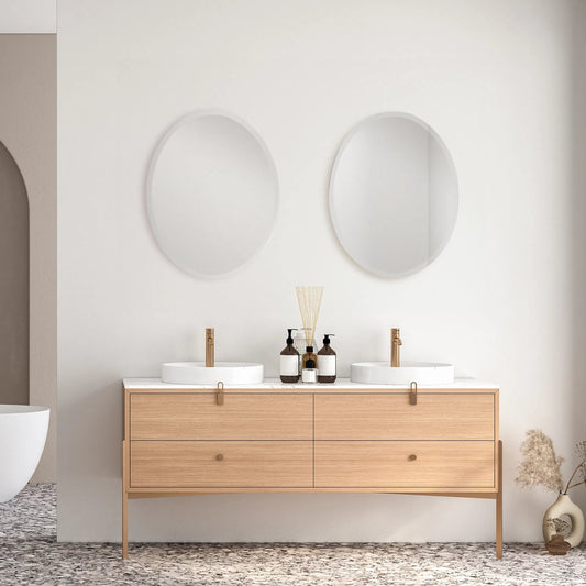 Frameless Vanity Oval Mirror by Uttermost. Made from glass in a modern style.