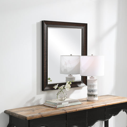 Wythe Mirror by Uttermost in mahogany. Made from mirror, mdf, paper in a transitional style.