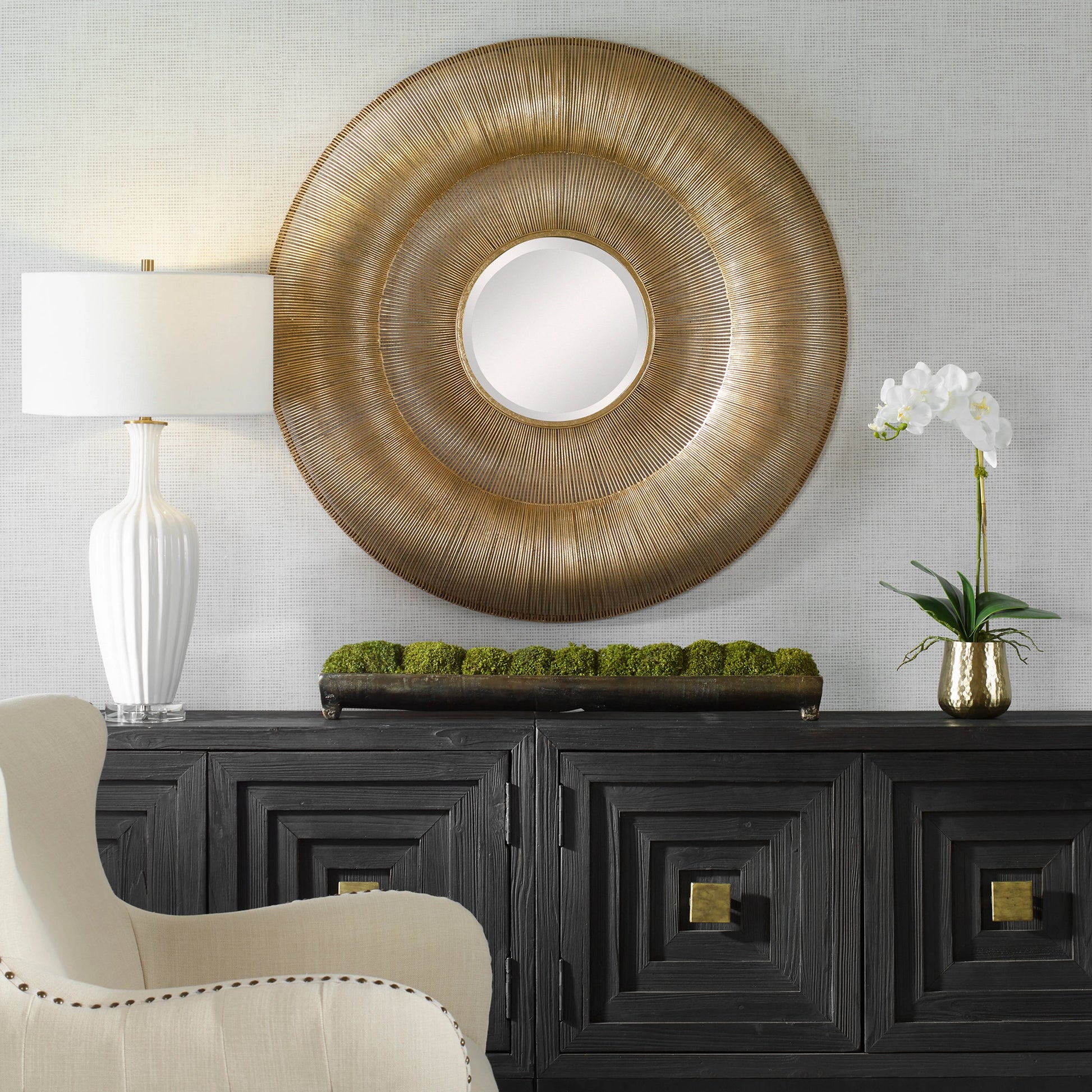 Bauble Round Mirror by Uttermost in antique gold. Made from iron, mirror, mdf in a coastal style.