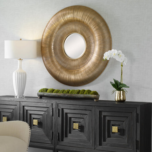 Bauble Round Mirror by Uttermost in antique gold. Made from iron, mirror, mdf in a coastal style.