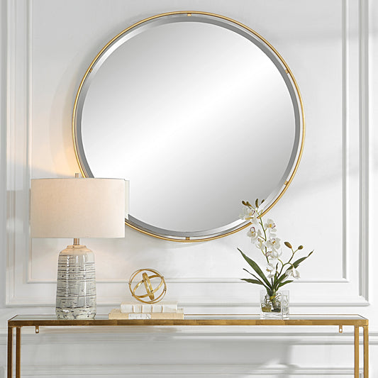 Canillo Round Mirror by Uttermost in antiqued gold leaf. Made from mirror, iron, mdf in a modern style.