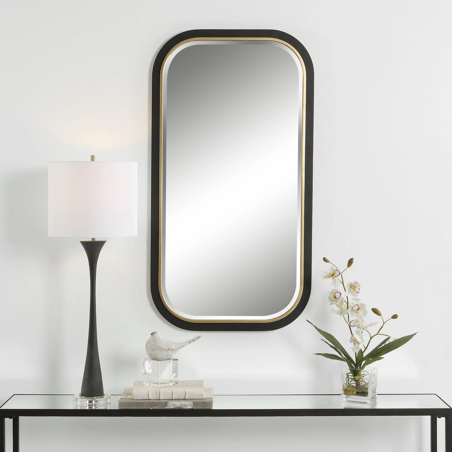 003 SI-1981205 | Lifestyle | Nevaeh Curved Rectangle Mirror by Uttermost in satin black, gold leaf. Made from iron, mdf, mirror in a modern style.
