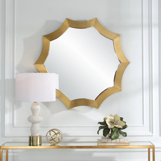 Flare Round Mirror by Uttermost in brass. Made from stainless steel, mirror, mdf in a modern style.