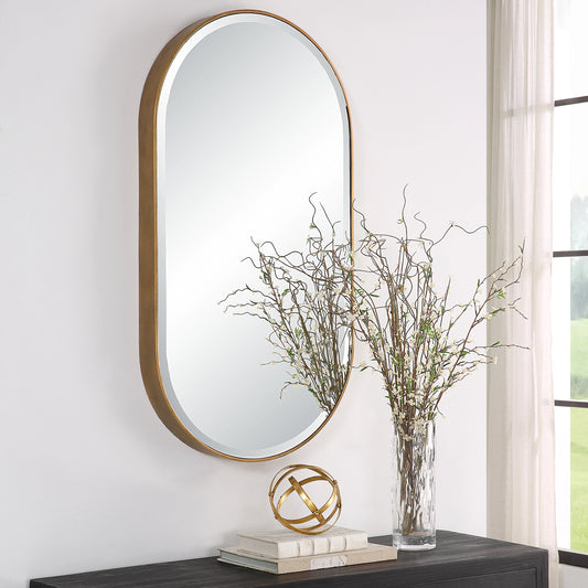 Lago Oval Mirror by Uttermost in golden bronze. Made from iron, mirror in a modern style.