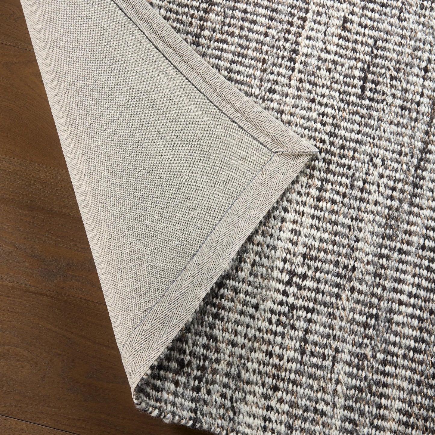 004 SI-2542808,SI-2542809,SI-2542810 | Closeup | Melera MLR04 Rug by Jaipur Living in brown, tan, taupe. Made from 80% wool 20% jute in a unique style.