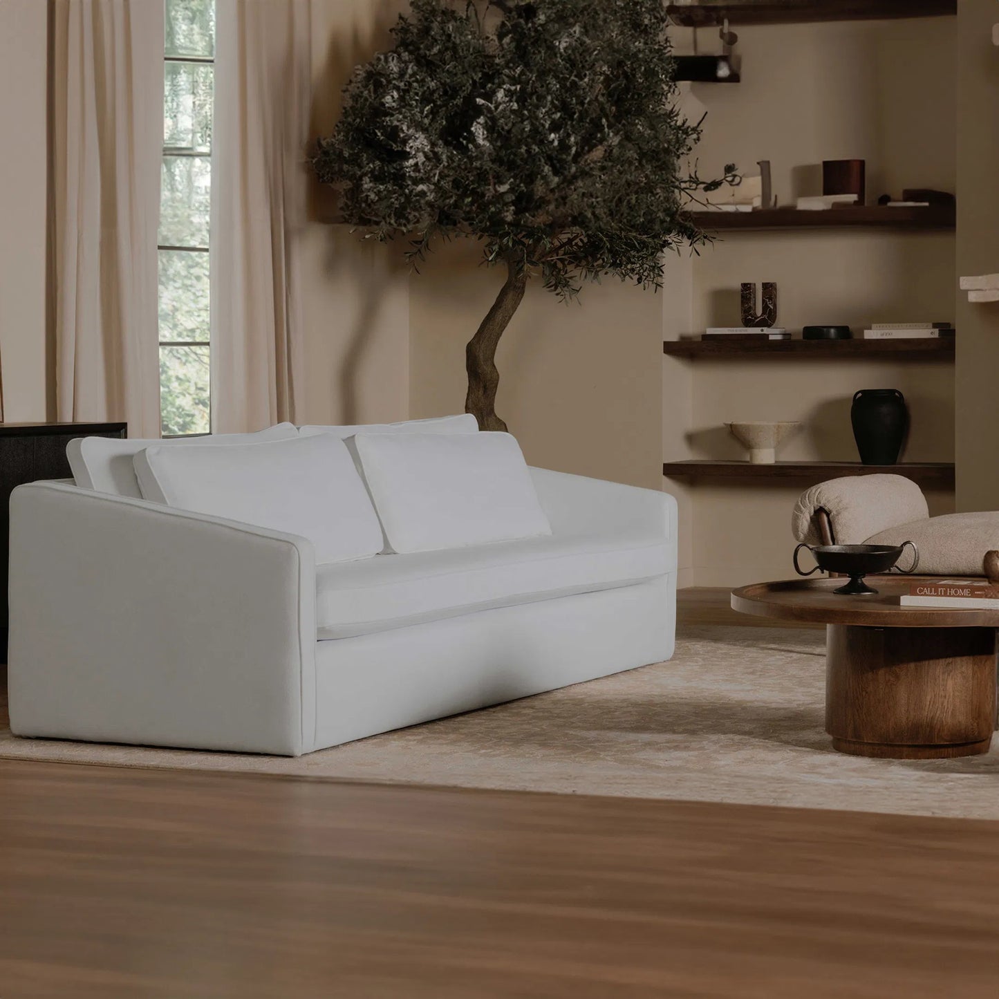 010 SI-2441553 | Lifestyle | Phoebe Sofa by Moe's Home Collection in white. Made from 100% polyester, foam core with 70% feather, 30% fibre fill, solid wood, plywood frame, plastic leg in a transitional style.