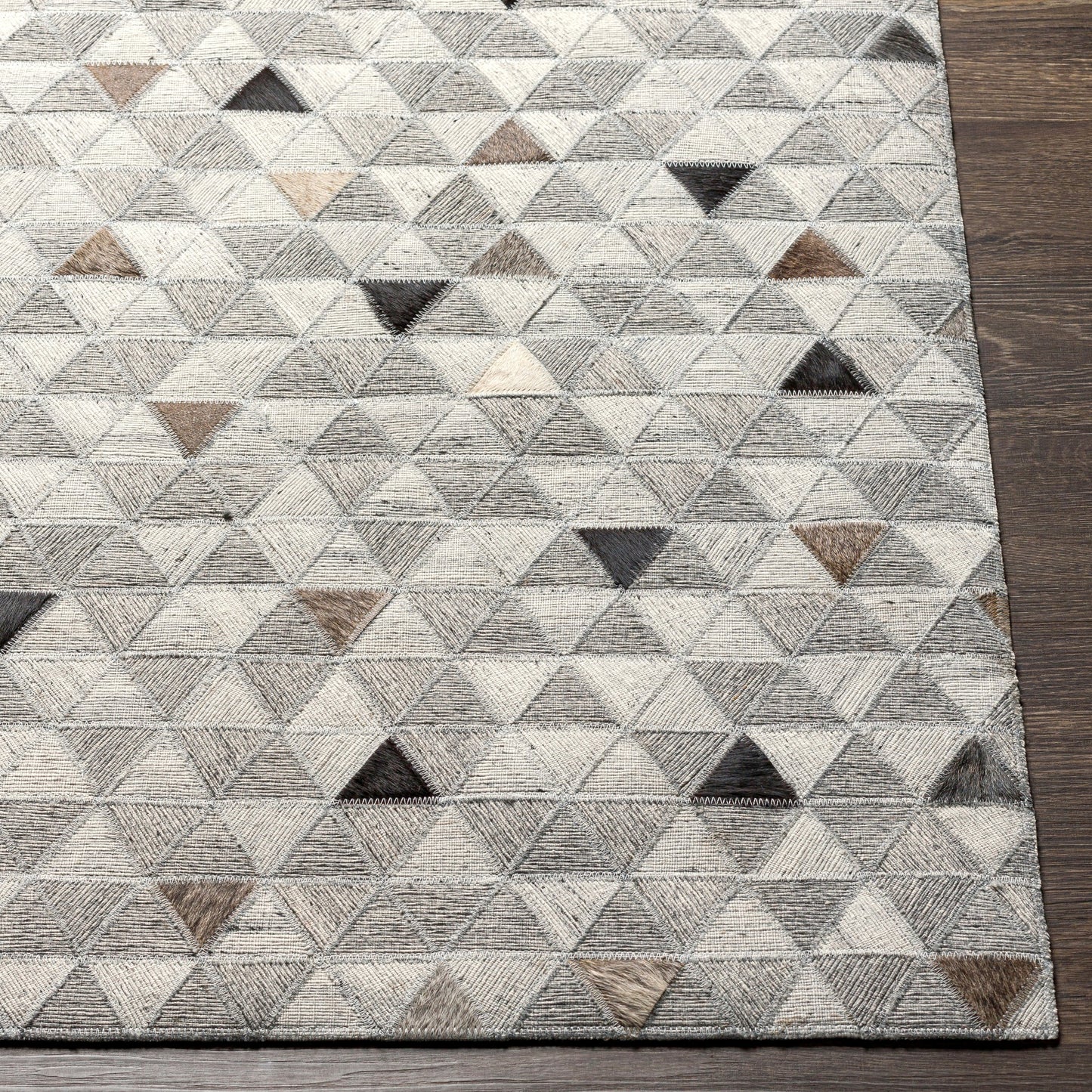 004 SI-1886223,SI-1886224,SI-1886226 | Closeup | Medora Rug - 30191 by Surya in gray, black, light gray, medium brown, light brown, tan. Made from 65% viscose, 35% leather in a unique style.